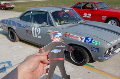 Flat Stanley with Corvair: Flat Stanley poses with Corvair he will be racing in.